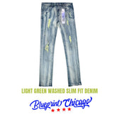 Light green washed slim-fit denim with distressed rips, faded wash, and a blue brand tag attached to the waistband.