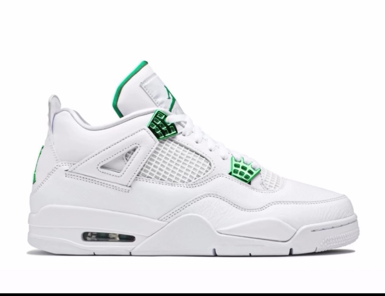 A side view of a white and green Air Jordan 4 sneaker with mesh detailing, green accents, and a visible Air unit in the heel.
