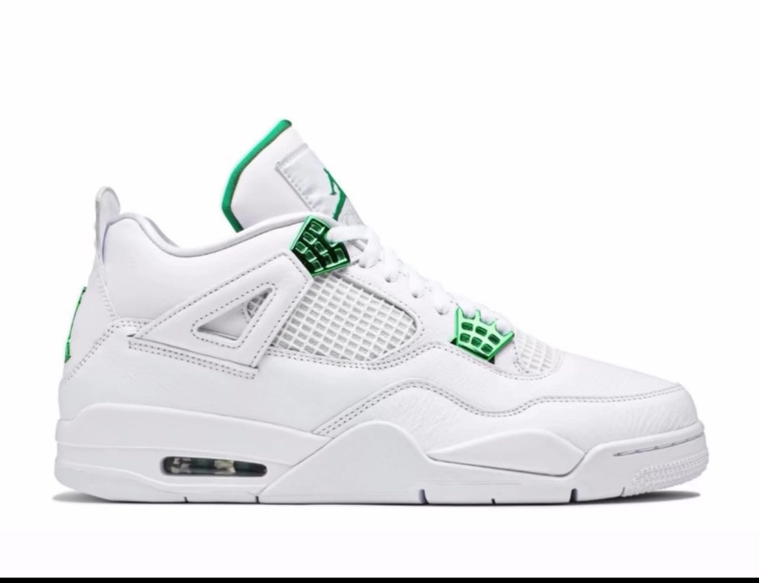 A side view of a white and green Air Jordan 4 sneaker with mesh detailing, green accents, and a visible Air unit in the heel.