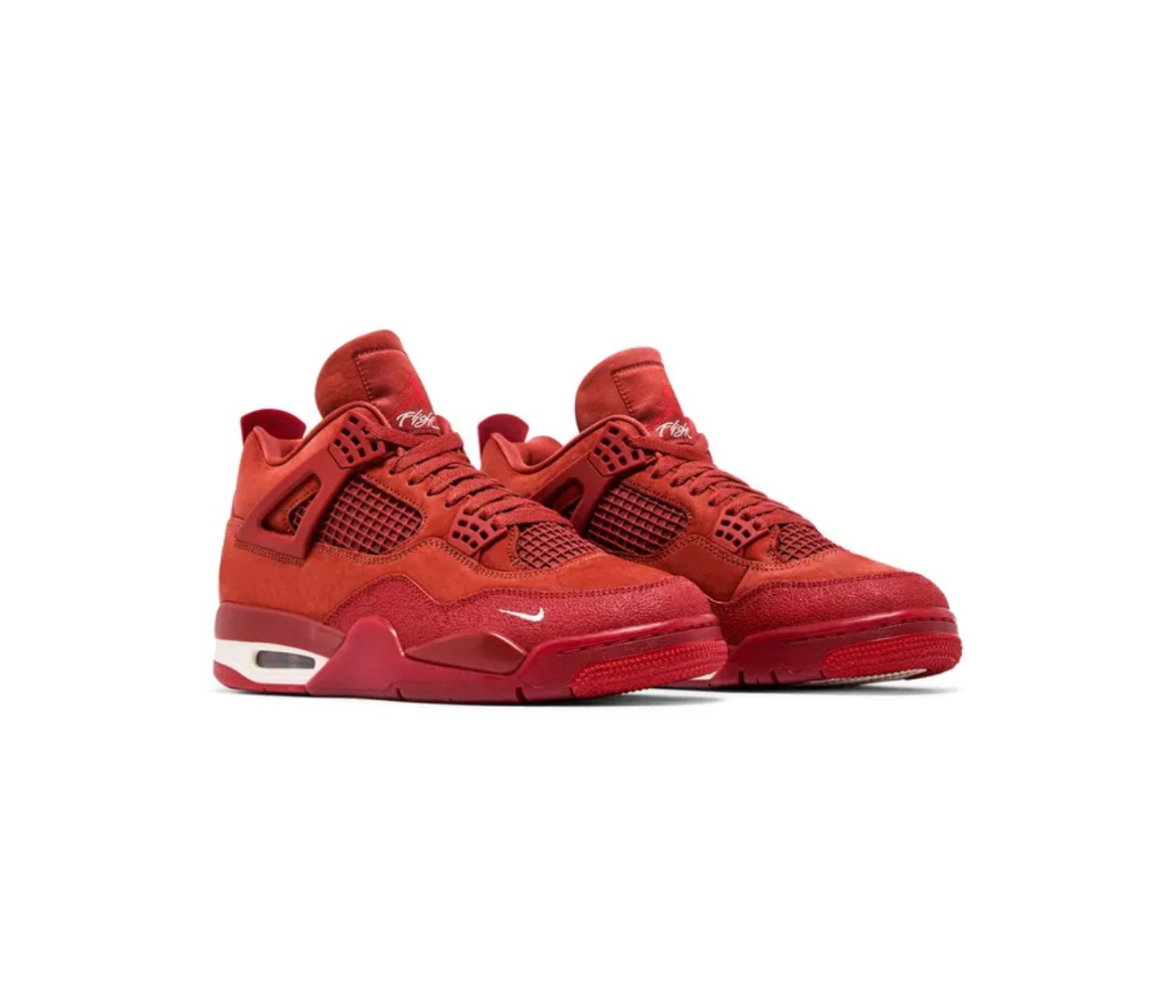 Pair of red sneakers with mesh panels, lace-up closure, and white accents, set against a white background, side by side.