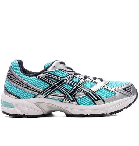 A side view of a turquoise and silver ASICS running shoe with mesh detailing, reflective stripes, and a cushioned sole for comfort.