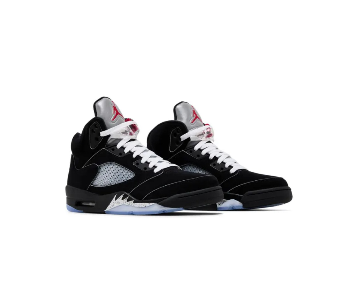 Air Jordan 5 sneakers in black with silver tongues, red Jumpman logo, white laces, icy blue soles, and mesh side panels on white.