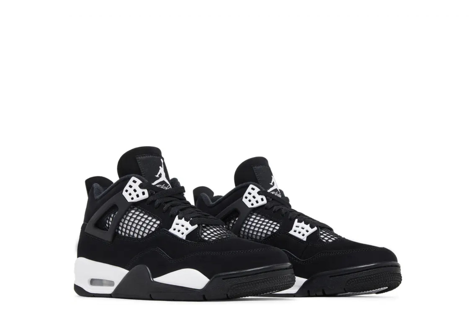 Pair of black and white Air Jordan 4 sneakers with mesh panels, black laces, and white sole accents on a white background.