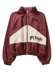 Maroon Rhude zip-up jacket with white diagonal panel, green and yellow logo, “World Championship Team” text, and elastic cuffs and hem.