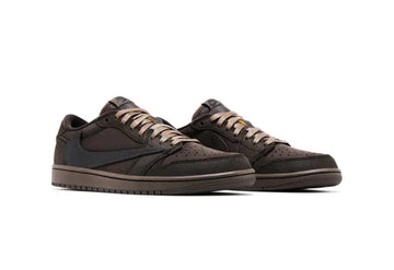 Pair of low-top Nike sneakers in dark brown with black swooshes, beige laces, and a textured sole on a white background.