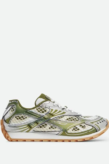 Olive green and silver mesh sneakers with a sporty design, featuring a gum sole and sleek, futuristic accents.