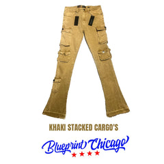 A pair of khaki stacked cargo pants with multiple pockets on the sides, featuring black tags and the "Blueprint Chicago" logo at the bottom.