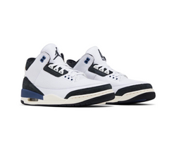 Pair of white and black Air Jordan sneakers with blue accents and visible air sole, photographed on a white background.