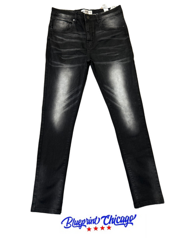 Black slim-fit jeans with light fading and whiskering, displayed flat with a "Blueprint Chicago" label and logo at the bottom.
