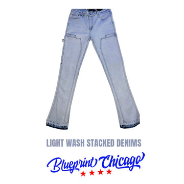 Light-wash stacked denim jeans with a faded design, featuring multiple pockets, displayed with a "Blueprint Chicago" label.
