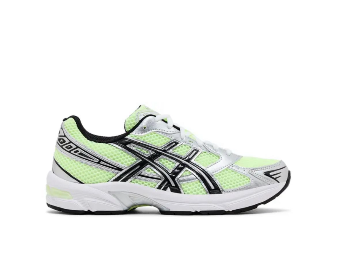White and neon green mesh sneakers with silver and black accents, featuring a sleek design for athletic wear or casual style.