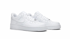 A pair of white Nike Air Force 1 sneakers with perforated toe, laces, and the signature swoosh logo on the sides.