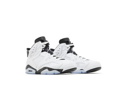 Pair of Air Jordan 6 sneakers in white and black colorway, featuring perforated leather upper and icy translucent rubber outsole.