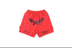 Red shorts featuring a bold "Yogos" print and spider web designs, perfect for a casual, streetwear-inspired look.