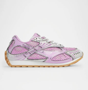 Pink and silver running shoes with mesh fabric, sleek design, and a light gum sole, offering both style and comfort for active wear.