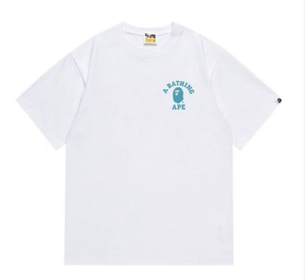 A white t-shirt featuring the "A BATHING APE" logo in teal, with a small ape face graphic on the chest.