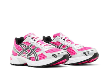 Pink and white athletic sneakers with black and silver accents, featuring mesh material and laced-up design.