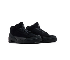 A pair of all-black Air Jordan 2 sneakers with a glossy patent leather finish, featuring the Jumpman logo on the tongue.