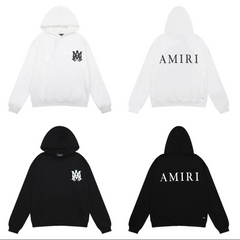 A white and black hoodie with "M" logo on the front left chest and "AMIRI" written on the back in large bold letters.