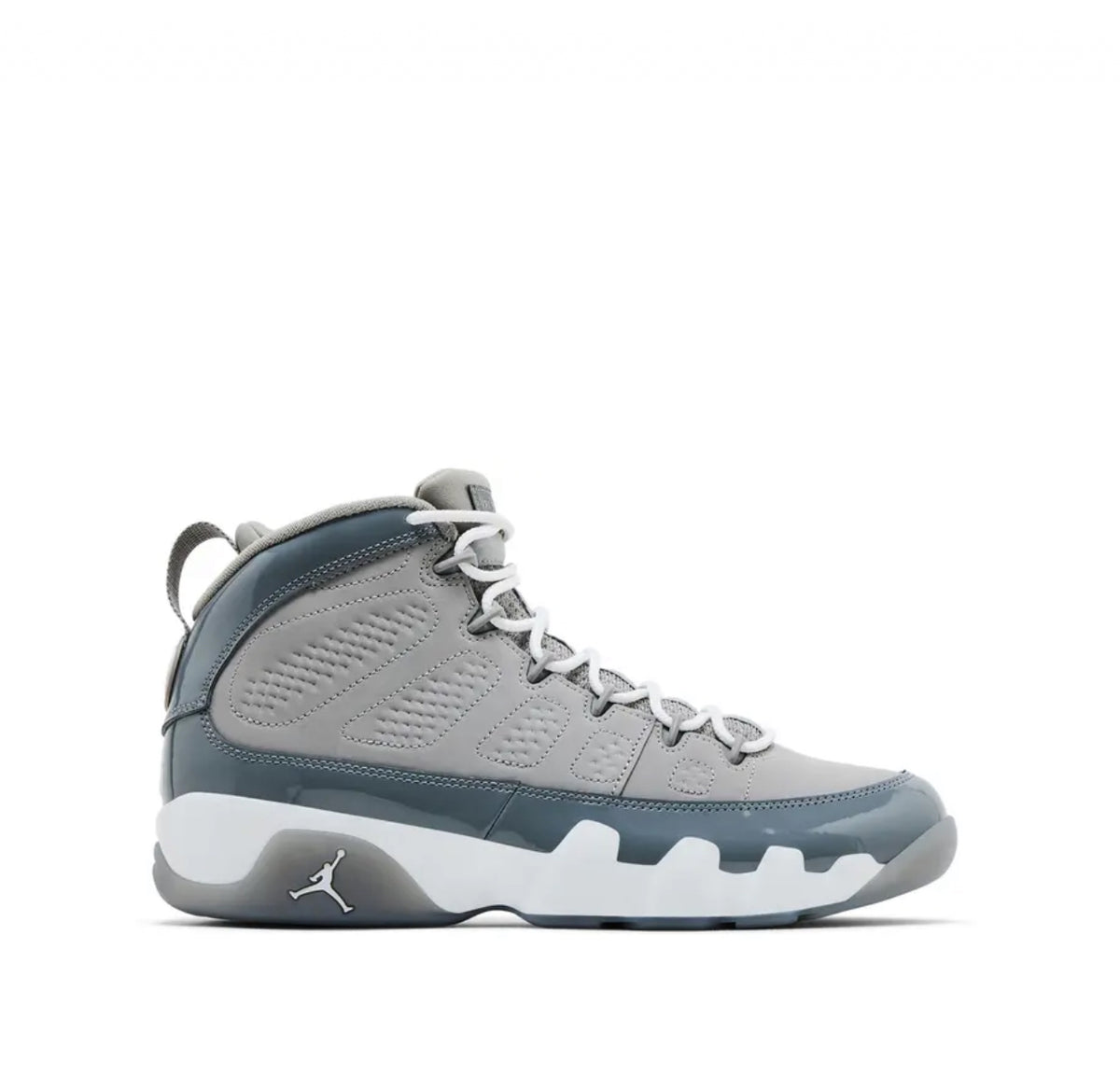 A side view of a grey and white Air Jordan 9 sneaker with a smooth leather upper and a white midsole featuring a Jumpman logo.