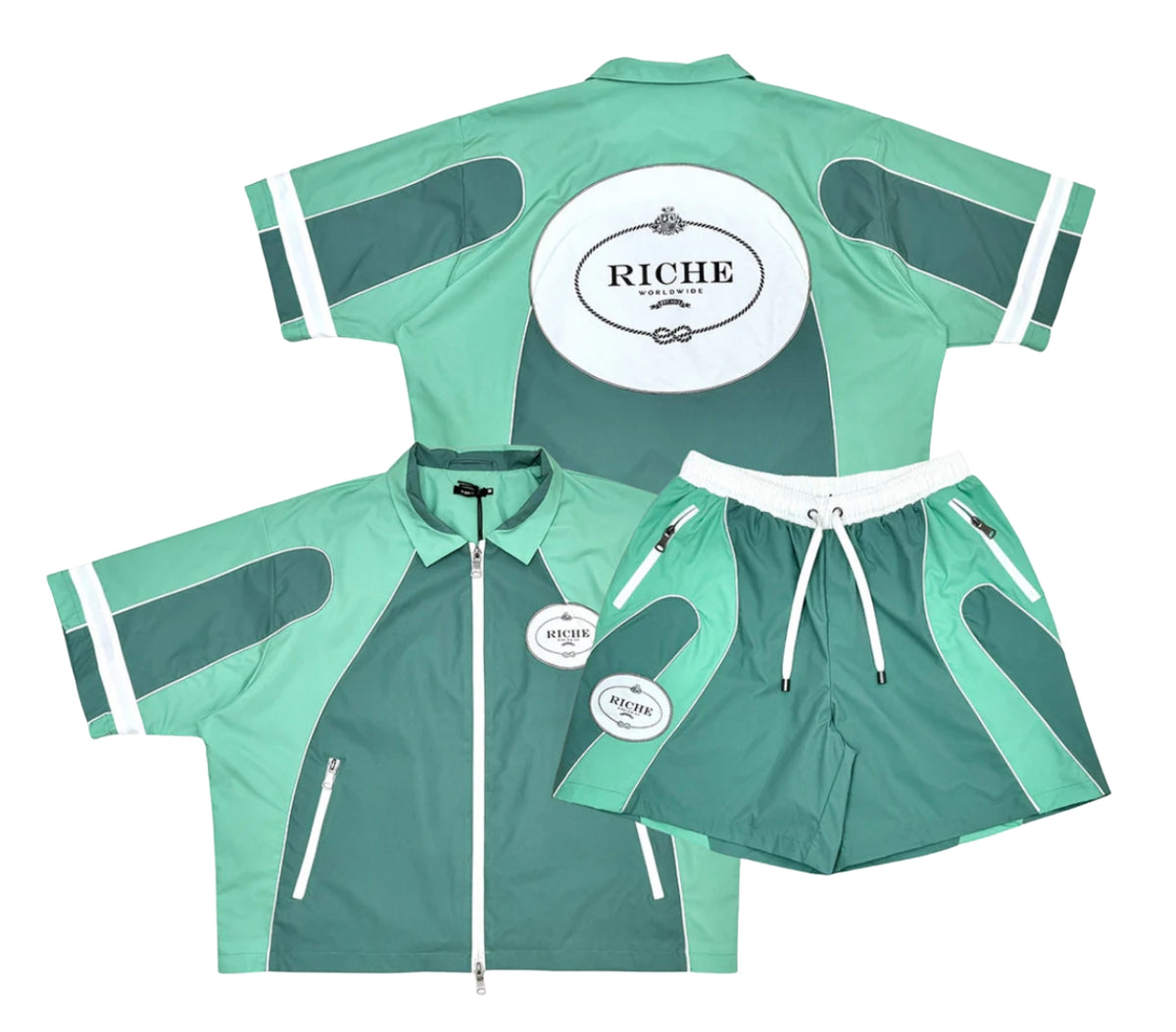 Mint green and dark teal short sleeve zip jacket with matching shorts, featuring white RICHE logos and zippered pockets.