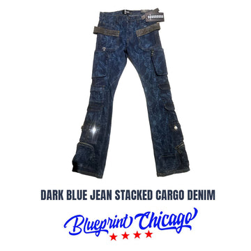A pair of dark blue stacked cargo jeans with multiple pockets, zippers, and a unique design, branded with the "Blueprint Chicago" logo.
