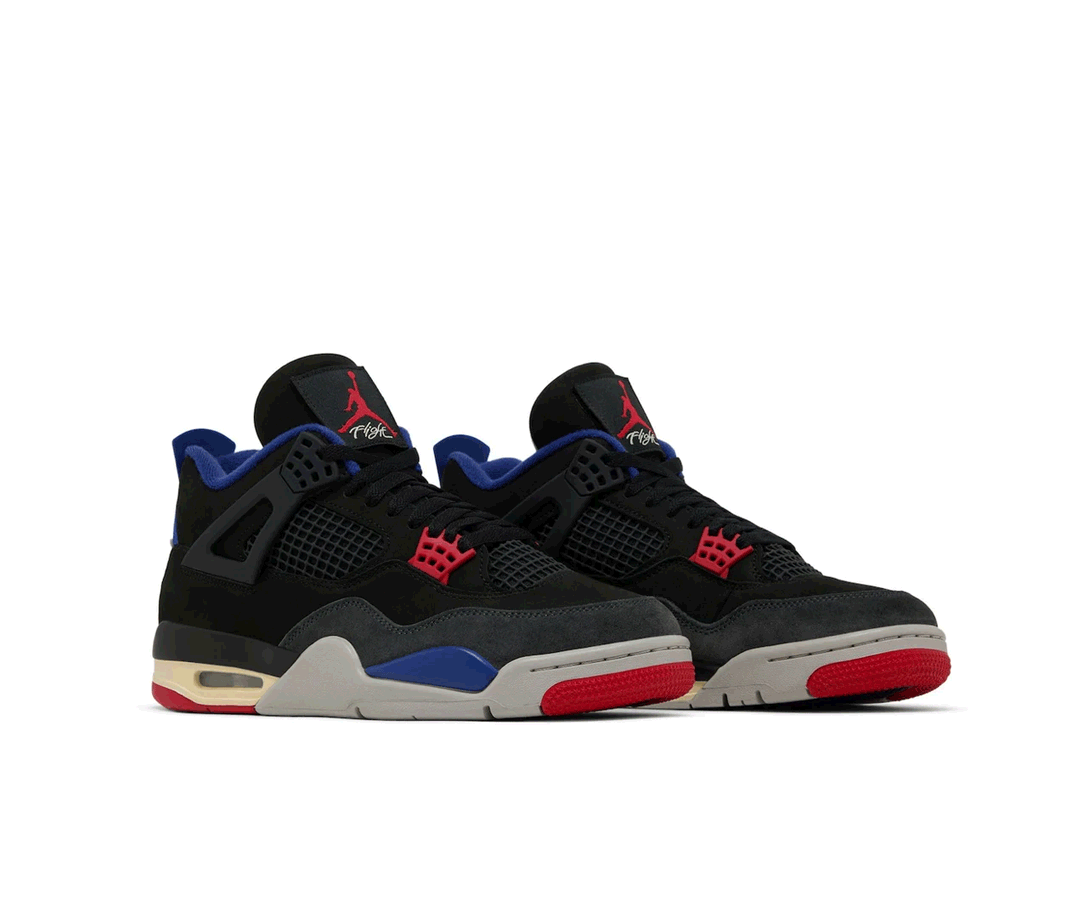 A pair of black, red, and blue Air Jordan 4 sneakers featuring a mix of suede and mesh with contrasting accents on the sole and tongue.