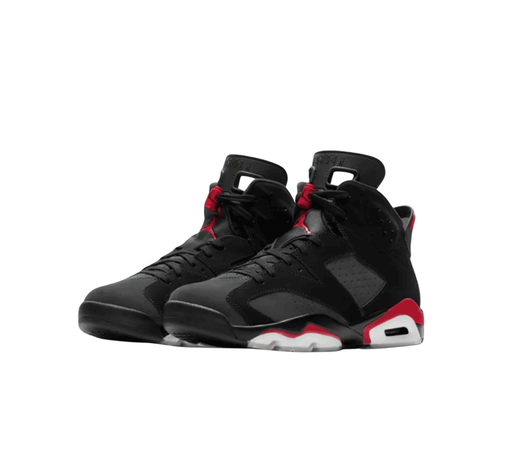 Pair of black high-top sneakers with red accents and white soles, displayed at an angled side view on a white background.